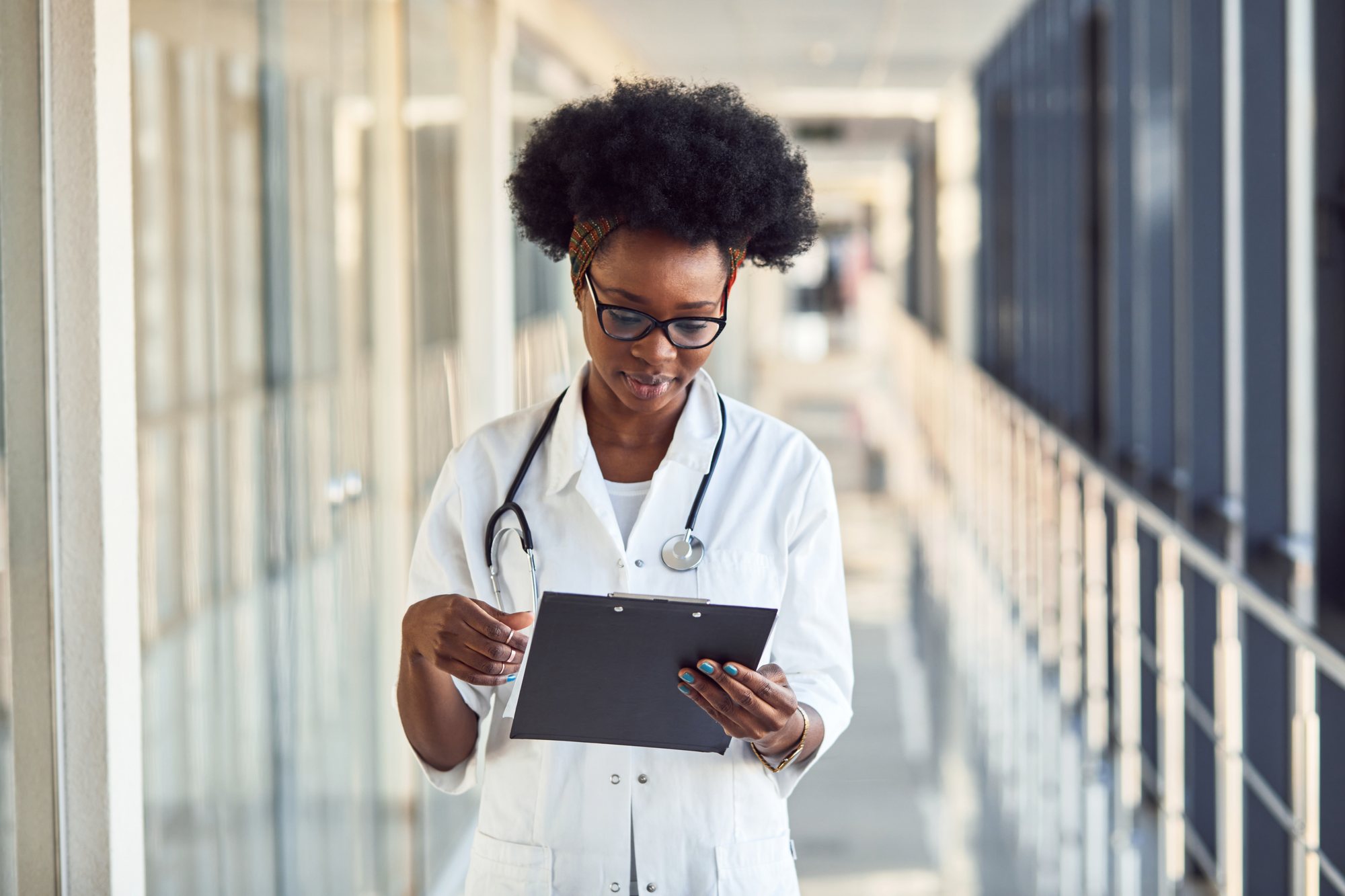 Stock photograph of a healthcare professional reviewing a chart